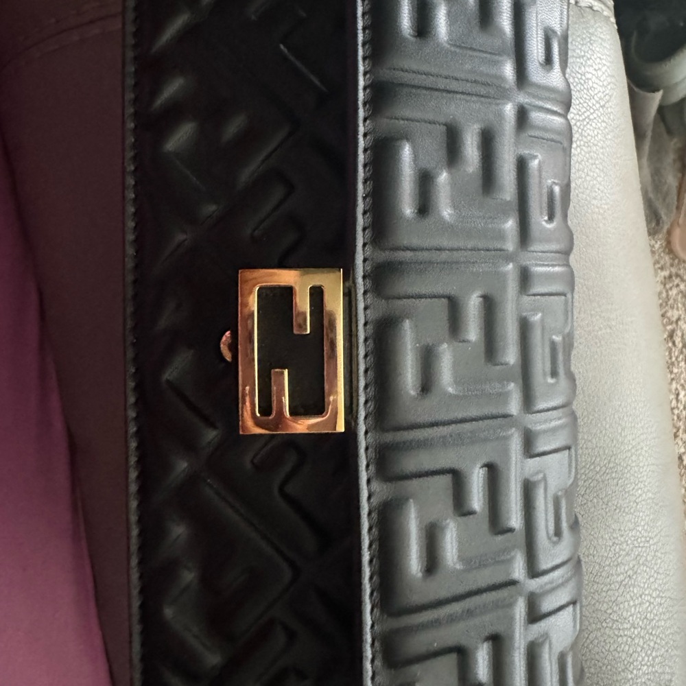 Elegant Black Mini Bag with Gold Accent